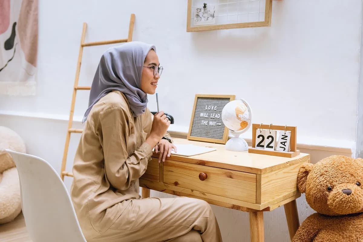 a young care worker doing some paperwork