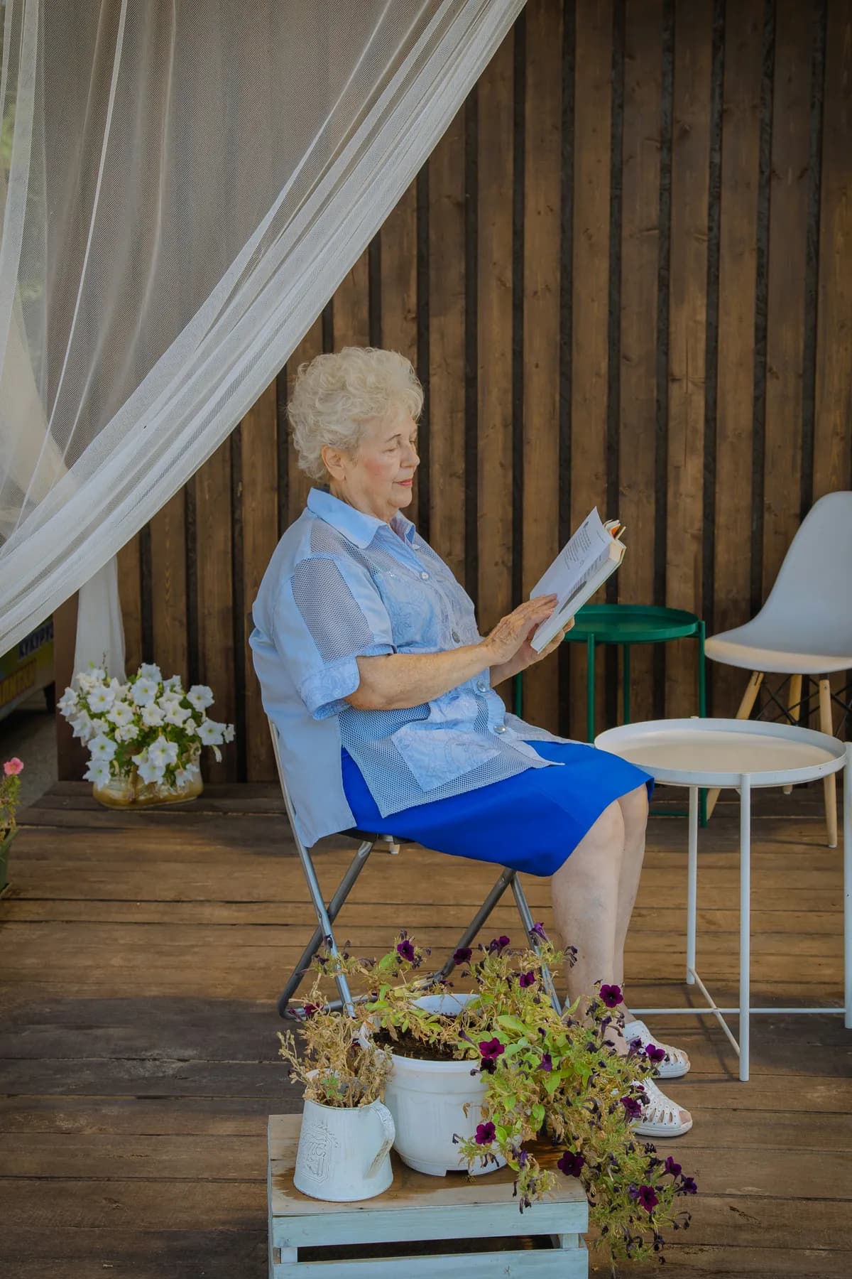 a lady at home reading a book and having a relaxing evening